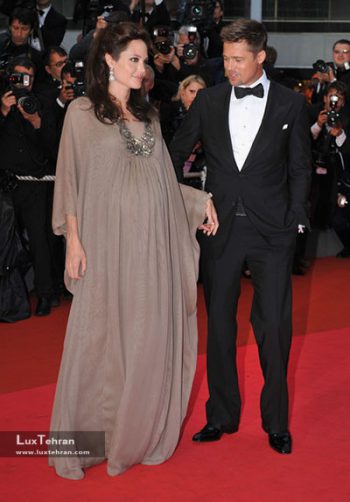 آنجلینا جولی در کنار همسرش برد پیت در جشنواره کن سال 2008 با لباسی از برند ریم آکرا